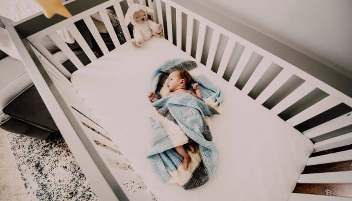 Baby sleeping in a crib